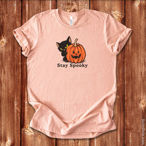 Stay Spooky Halloween cat t-shirt on a plain background