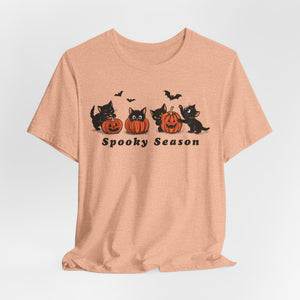 Spooky Season Halloween cat t-shirt in Heather Peach, flat lay