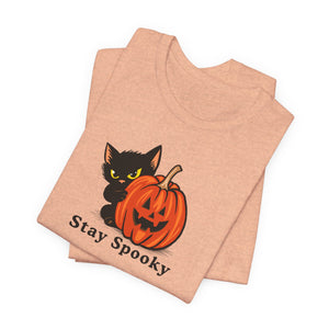 Stay Spooky Halloween cat t-shirt on a hanger