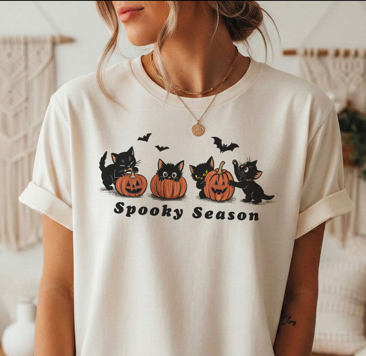 Woman wearing Spooky Season Halloween cat t-shirt in Natural